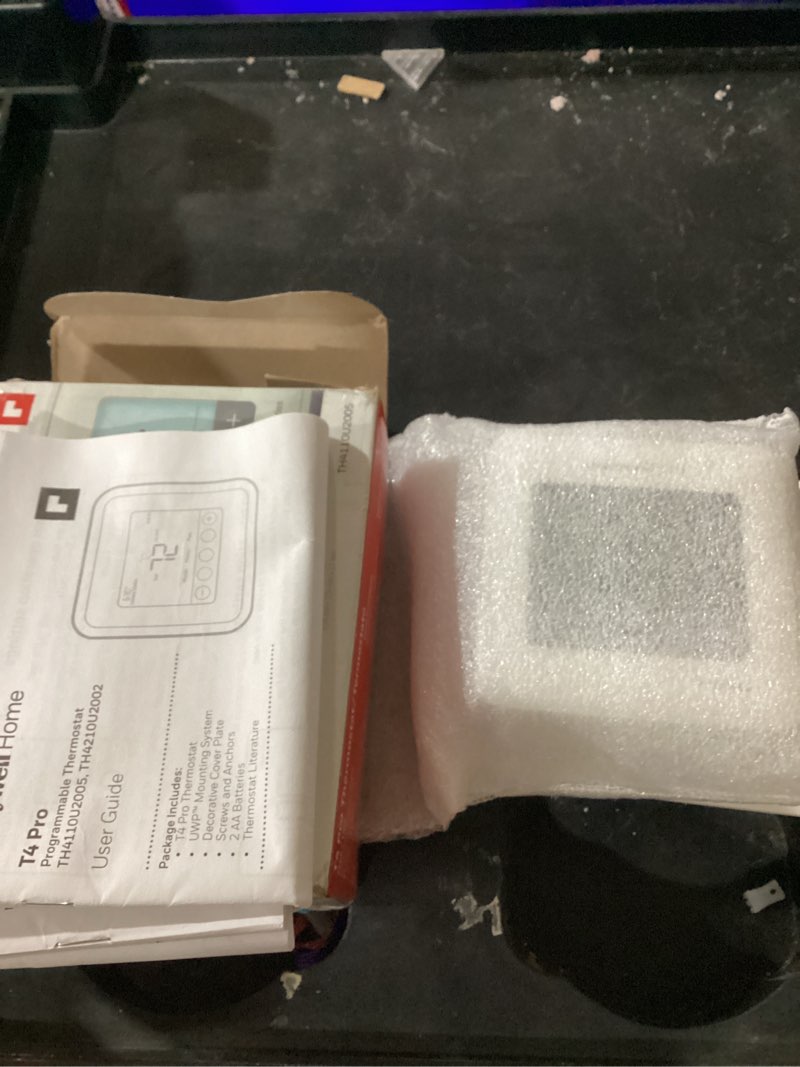 Condition photo showing New/Like New for honeywell - th4110u2005/u - t4 pro thermostat  programmable or non-programmable  1h/1c