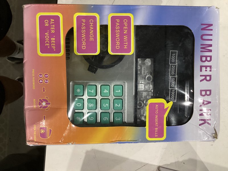 Condition photo showing As Is for Piggy Bank, Vcertcpl ATM Coin Money Saving Box with Password, Kids Safe Money Jar with Auto Grab Bill Slot, Birthday Gifts Toys Bank for 6 7 8 9 10 11 12 Year Old Girls Boys Black Large