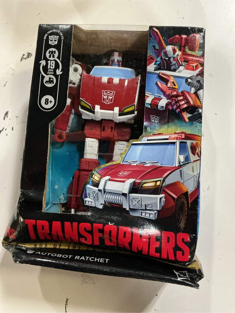 Condition photo showing New/Like New for transformers age of the primes autobot ratchet, deluxe class 5.75-inch converting action figure, rob
