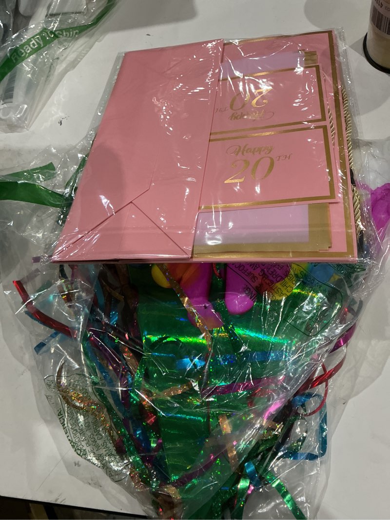Condition photo showing As Is for assorted celebration/decoration supplies (may include a variety of styles, colors, and the