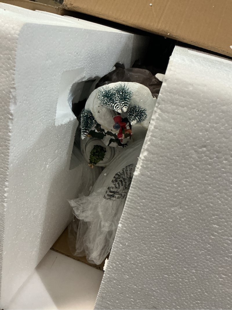 Condition photo showing As Is for 7.5\" White Lighted LED Musical Christmas Ice Skating Village Tabletop(similar)