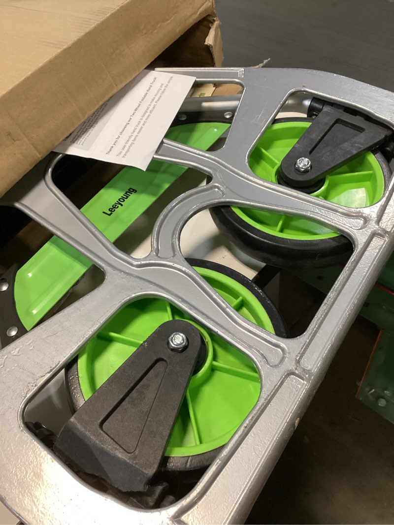 Condition photo showing As Is for leeyoung folding hand truck and dolly,309 lb capacity aluminum portable cart with telescoping handle and pp+eva wheels green 309lb