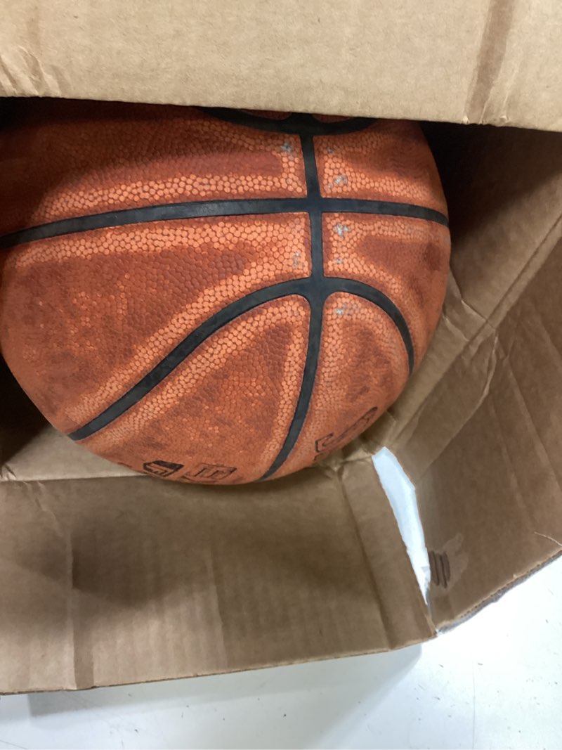 Condition photo showing As Is for wilson evolution basketballs brown size 7 - 29.5"