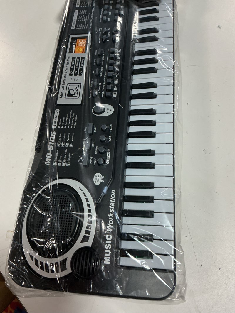 Condition photo showing As Is for 61 Key Piano Keyboard, Electronic Digital Piano for Kids Beginner with Microphone, 16 Tones, 6 Demos, 10 Rhythms, Recording, Keyboard Piano for Boys and Girls’ Christmas/Birthday Gift