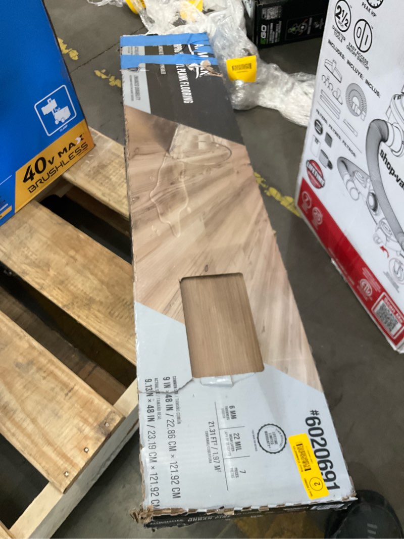 Condition photo showing As Is for stainmaster urban pine gray 22-mil x 9-in w x 48-in l waterproof interlocking luxury vinyl plank flooring (21.31-sq ft/ carton)