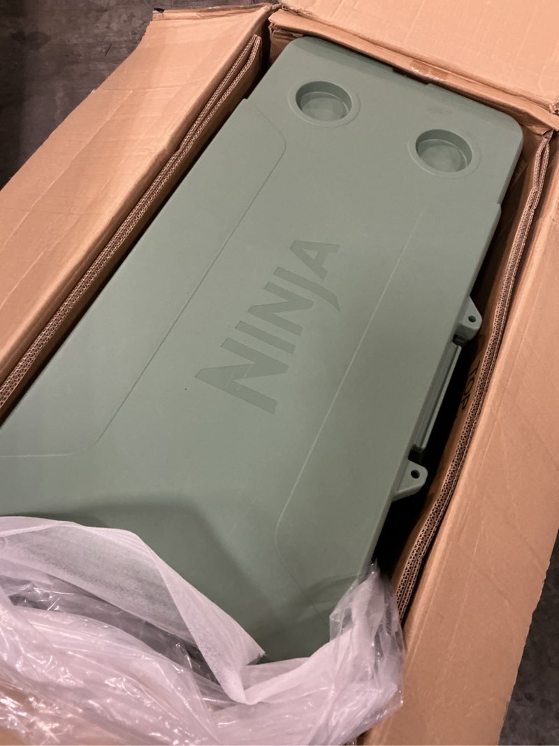 Condition photo showing As Is for ninja frostvault™ 65qt cooler with wheels, dry storage, spanish moss | ninja frostvault's 65-qt capacity holds 97 cans, keeps food cool & dry, and rolls easily on all-terrain wheels