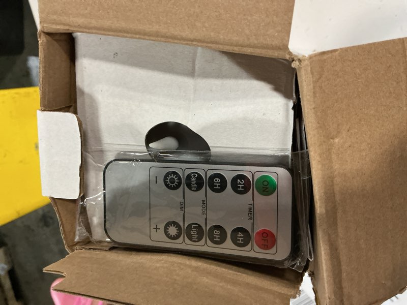 Condition photo showing Good Condition for 4" x12" Flameless Flickering Remote White Candles with Candle Grease and Timer, LED Battery Operated Fake Real Wax 3D-Wick Pillar Candles, Pack of 1 White 4" x12"