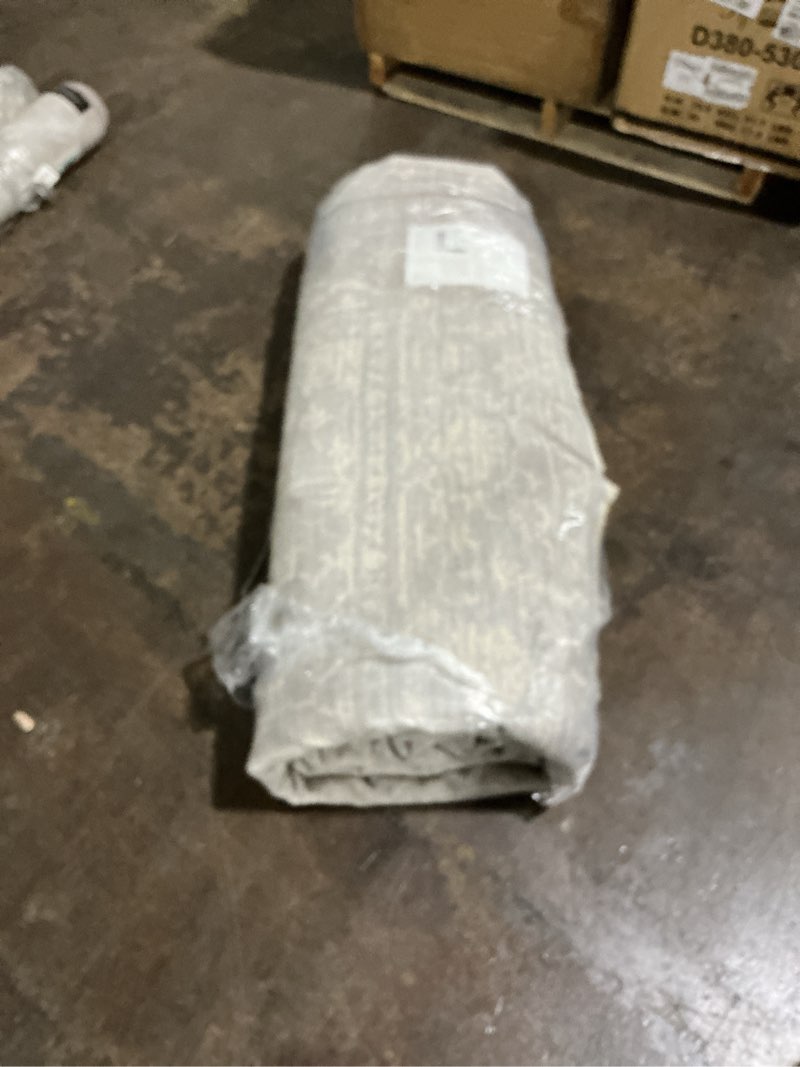 Condition photo showing Good Condition for Loloi II Sorrento Collection SOR-01 Midnight/Natural 6'-7" x 9'-10" Area Rug