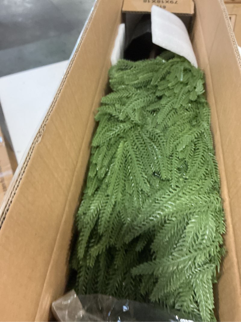 Condition photo showing Good Condition for BLOSMON Outdoor Christmas Trees for Porch: 4 Ft Norfolk Pine Tree with 100 LED Lights Remote Control