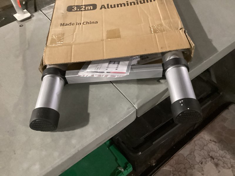 Condition photo showing As Is for rikade telescoping ladder 10.5ft & attic ladder, heavy duty aluminum with non-slip feet, 330lb capacity for rv, attic, roof & multi-surface use