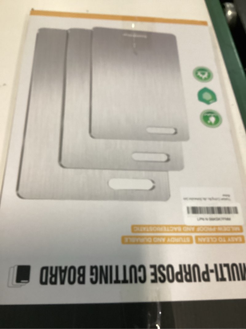 Condition photo showing Good Condition for titanium cutting boards set of 3, 100% pure titanium kitchen cutting board, double-sided non-toxic cutting board, ideal for slicing and dicing meats, features handle, dishwasher safe silver 16"l*10"w(s+m+l)