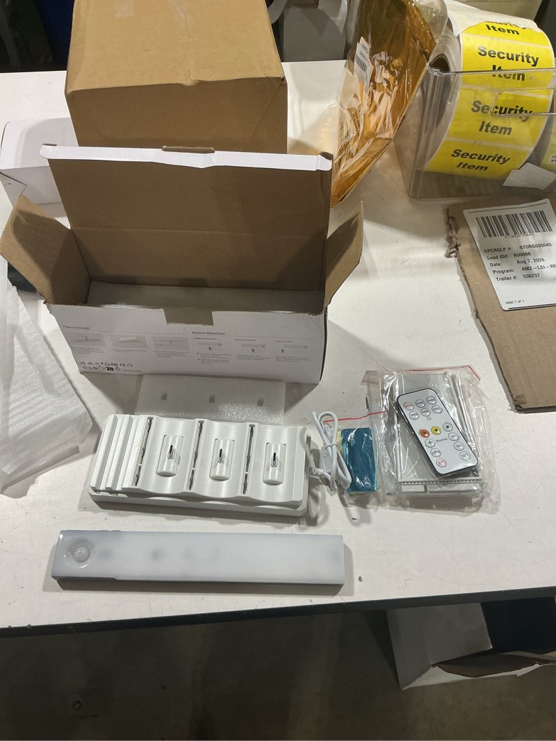 Condition photo showing Good Condition for ezvalo 6-pack under cabinet lighting with charging station, 2000mah rechargeable wireless motion sensor lights, 3 color temps, dimmable, timer, magnetic, with remote control for kitchen, closet, stair 6pack with station