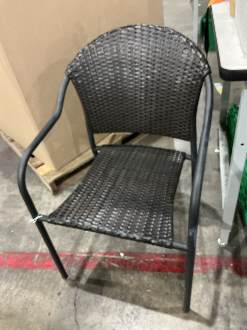 Condition photo showing As Is for style selections pelham bay wicker stackable matte black metal frame stationary dining chair(s) with woven seat