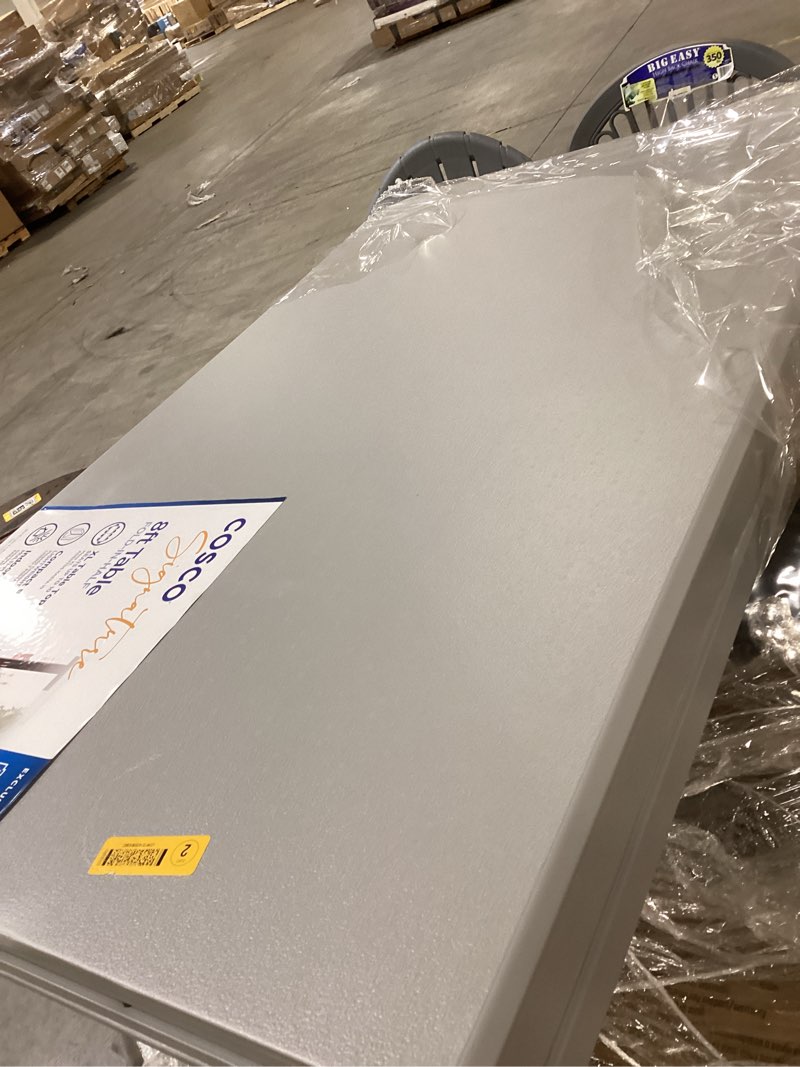 Condition photo showing Good Condition for cosco 2.6-ft x 8-ft indoor rectangle resin gray folding banquet table