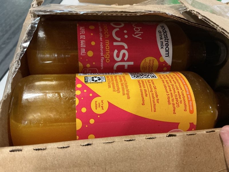 Condition photo showing New/Like New for (expiry date:04/07/2027) sodastream bubly burst peach mango new pour bottles, 14.9 fl oz (pack of 4) peach mango new pour 14.9 fl oz (pack of 4)