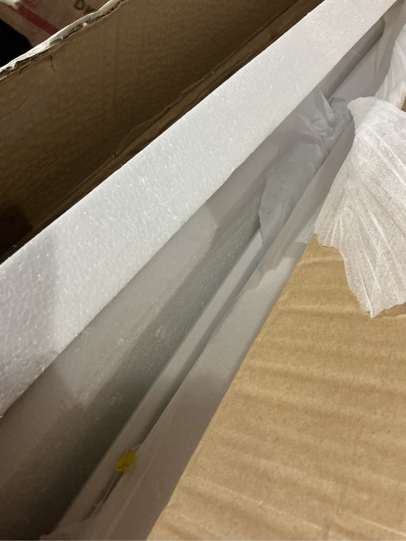 Condition photo showing As Is for Benjara Cofffee Hle 51 Inch Coffee Table, Rectangular White Top, Powder Coated Legs, Wood (Incomplete, box 1/2 )