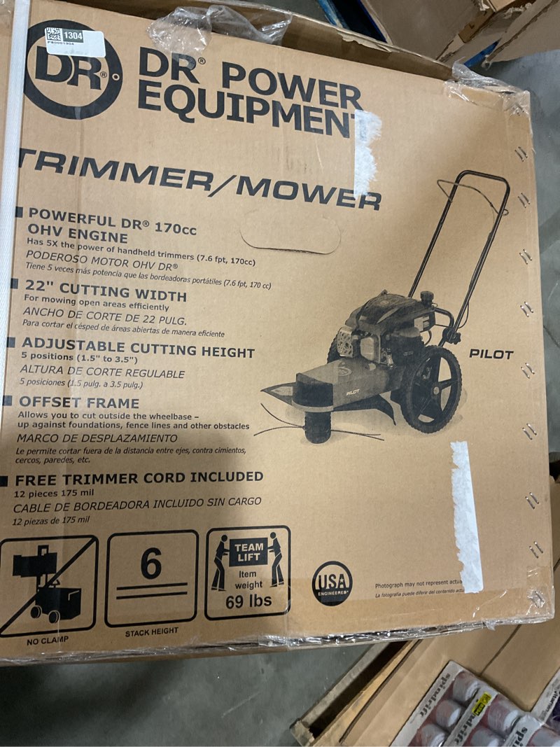Condition photo showing New/Like New for tr47010den pro xlsp trimmer mower, 10.30 ft/lb dr engine, 22" cutting width, electric start, 5 different cutting, no wrapping, cast aluminum nose plate, cast aluminum nose plate, 14" wheels
