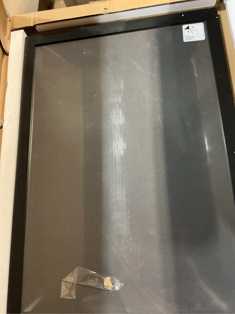 Condition photo showing As Is for americanflat 19x27 poster frame - black engineered wood with polished plexiglass - wide picture frame for vertical or horizontal wall display - epic collection - black 19x27 black