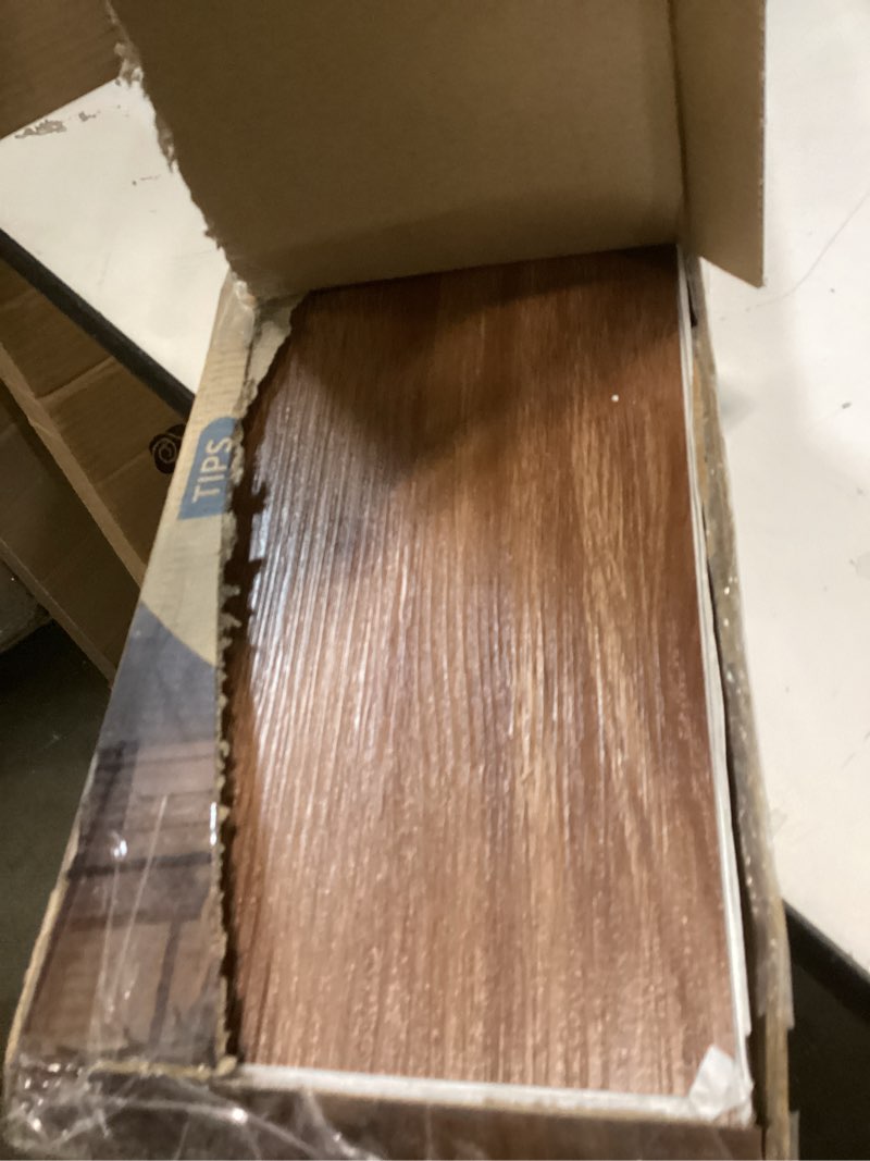 Condition photo showing Good Condition for Art3d 36-Pack 54 Sq.ft Peel and Stick Floor Tiles Vinyl Plank Flooring Wood Look, Adhesive and Waterproof Tile Sticker for Bedroom, Living Room, Kitchen, RV in Rosewood 36 x 6 x 0.1 inches Rosewood 36