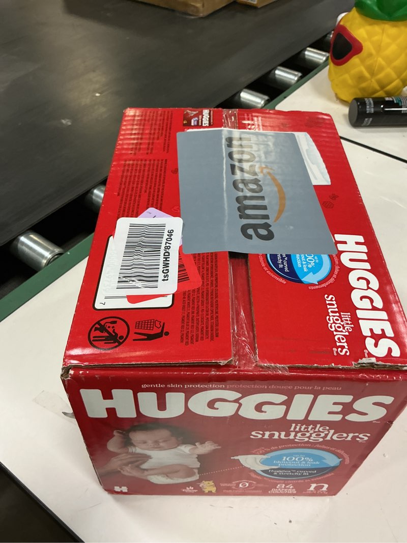 Condition photo showing New/Like New for Huggies Size Newborn Diapers, Little Snugglers Baby Diapers, Size Newborn (up to 10 lbs), 84 Count, Packaging May Vary Newborn 84
