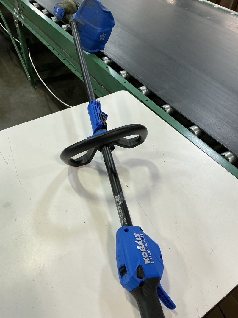 Condition photo showing As Is for kobalt gen4 40-volt cordless battery string trimmer and leaf blower and combo kit 4.0 ah (battery included) (charger included)