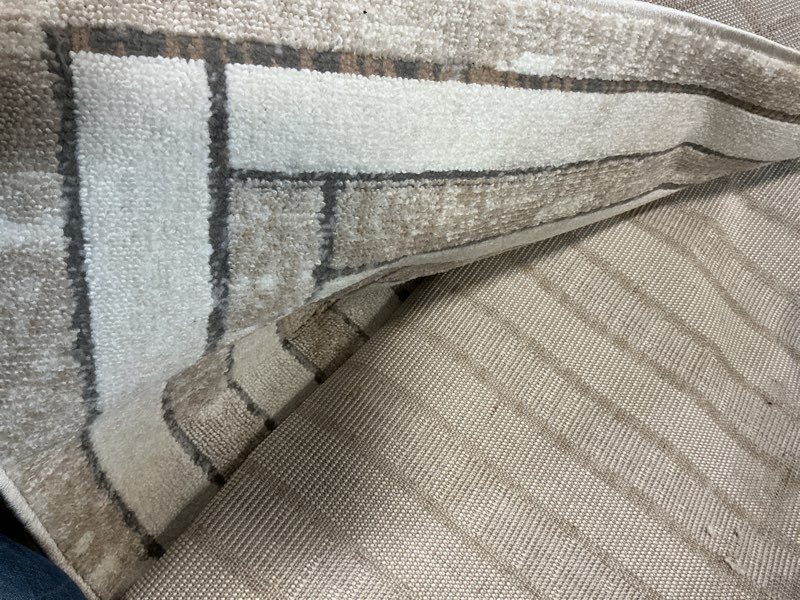 Condition photo showing Good Condition for style selections zeke 7 x 10 (ft) loomed polyester neutral rectangular indoor