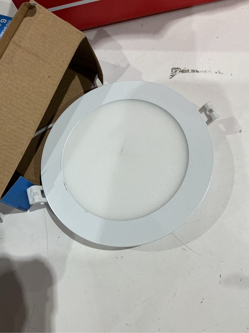 Condition photo showing As Is for utilitech white 6-in 850 -lumens switchable white round dimmable led canless wet rated recessed downlight
