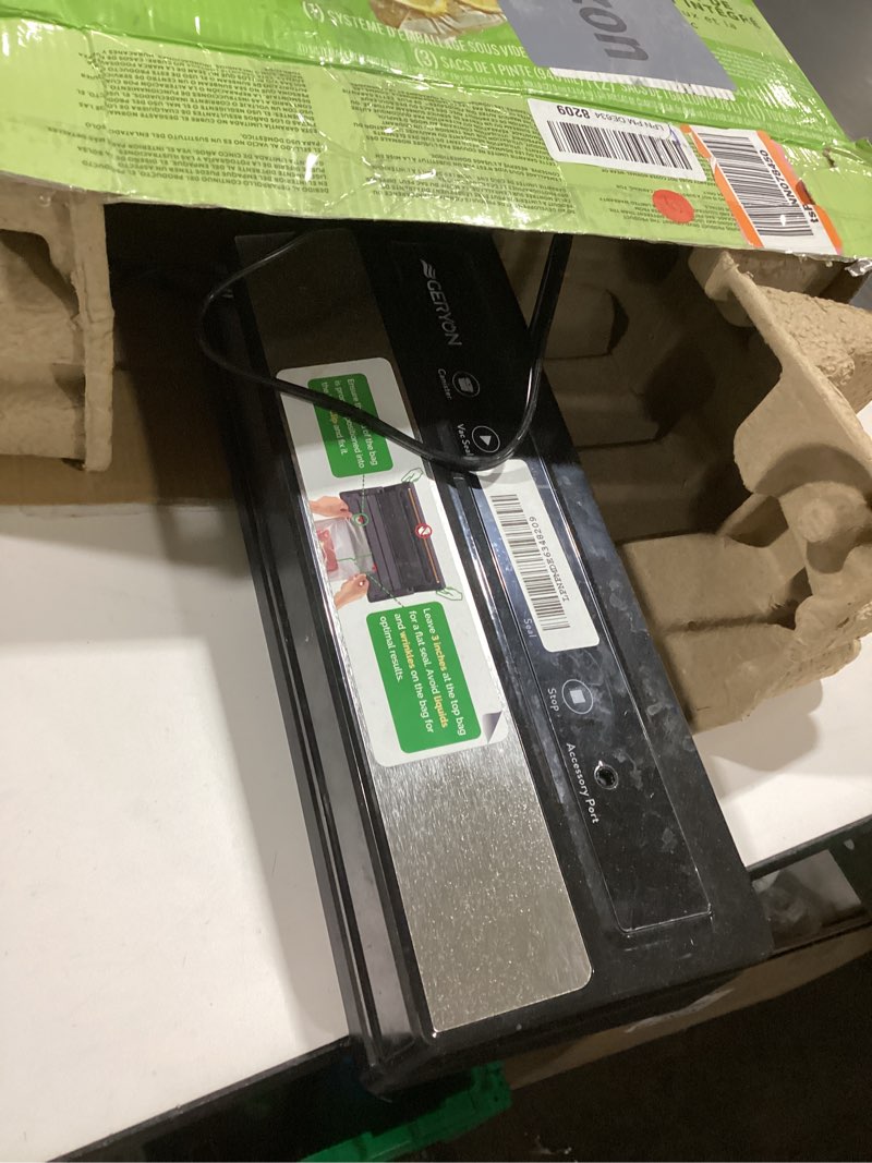 Condition photo showing As Is for FoodSaver Vacuum Sealer Machine, Automatic Bag Detection, Sous Vide Friendly, with sealer bags, roll, handheld vacuum sealer, black