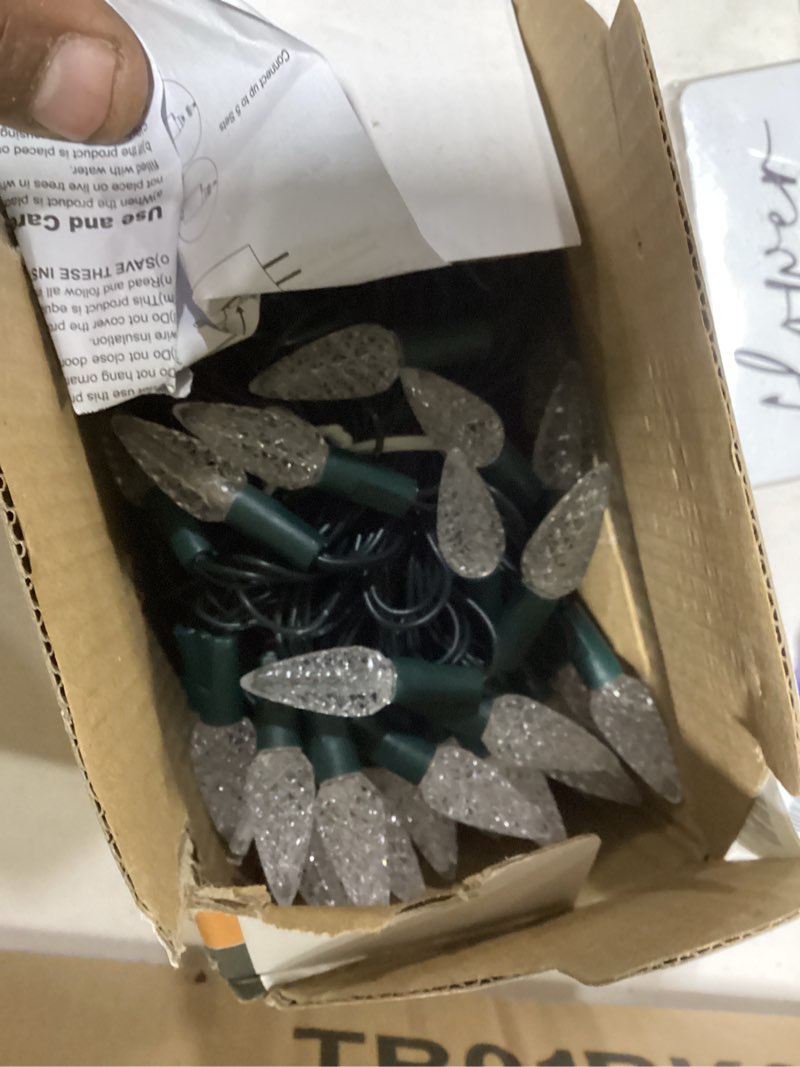 Condition photo showing Good Condition for WATERGLIDE C6 Christmas Lights, 33ft 100 LED Faceted String Lights Green Wire Fairy Lights with 29V Safe Adaptor, 8 Lighting Mode, Waterproof for Indoor Outdoor Patio Xmas Tree Party Decor, Warm White