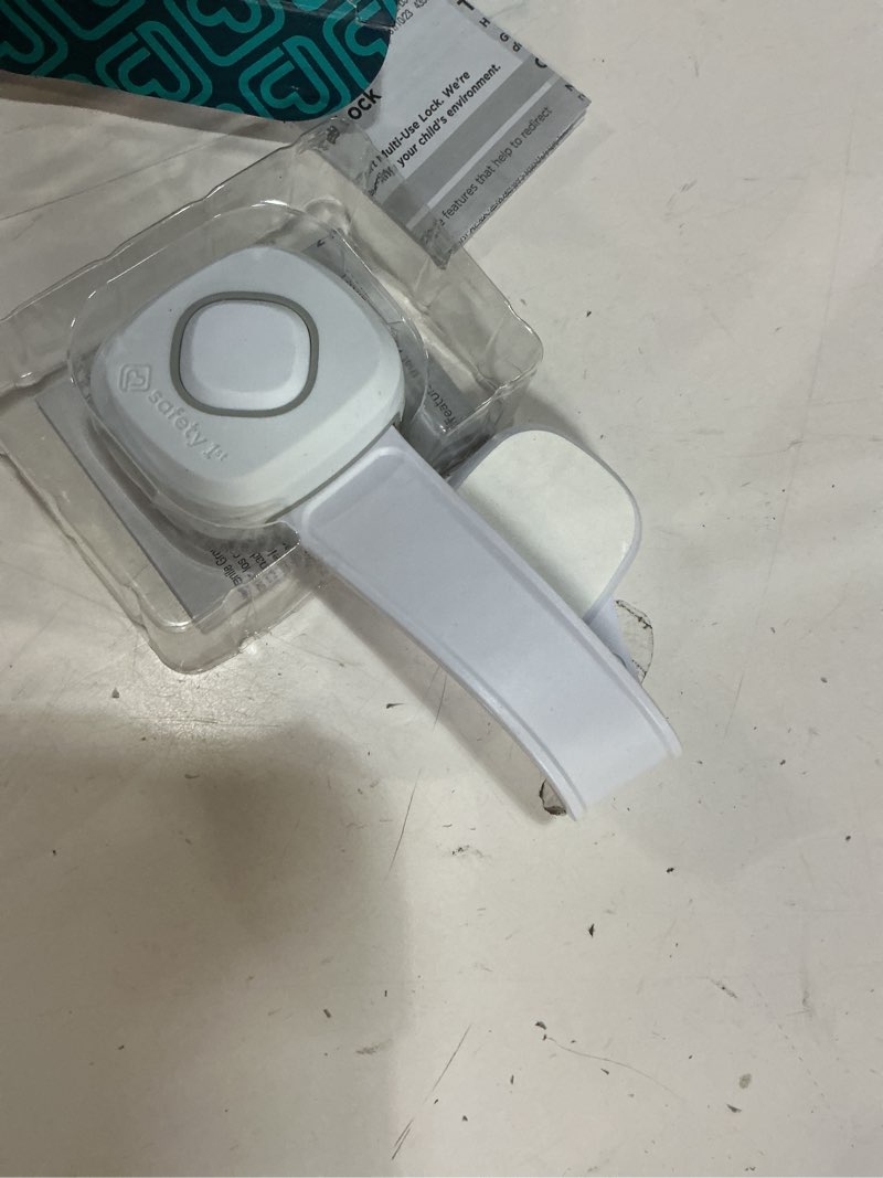 Condition photo showing As Is for safety 1st outsmart multi use lock, white pack of 1