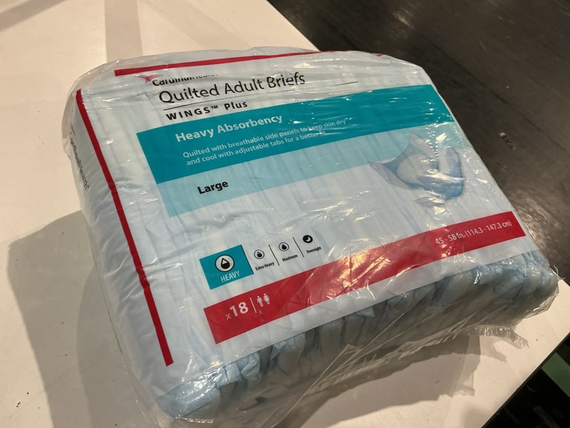 Condition photo showing As Is for cardinal 75343101 wings adult heavy-absorbent incontinence brief, blue - large - pack of 18
