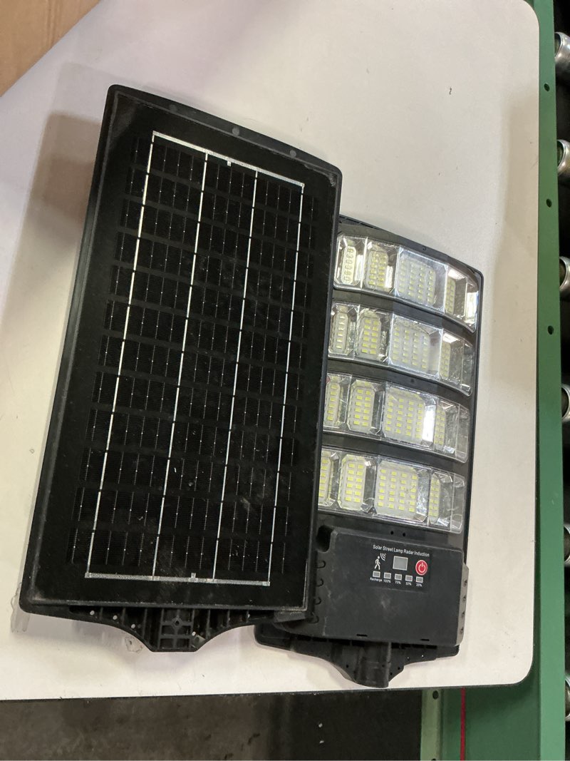 Condition photo showing As Is for (Similar to stock photo) 2 Pack Solar Street Lights Outdoor Waterproof 10000LM 6500K, Solar Light Outdoor Dusk to Dawn with Wide Angle Motion Sensor and Remote,Parking Lot Lights for Area Lighting Yard