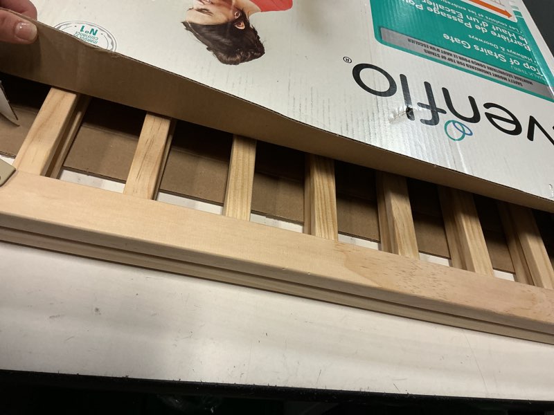 Condition photo showing As Is for evenflo walk-thru top of stairs baby gate, natural wood