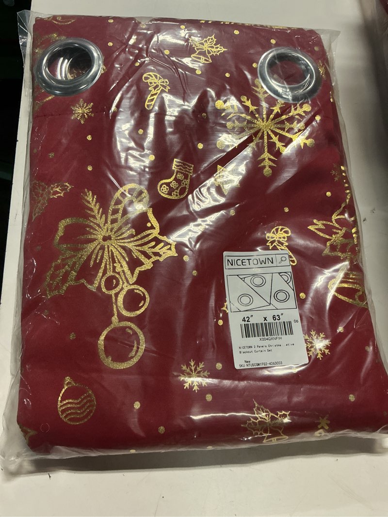 Condition photo showing New/Like New for NICETOWN 2 Panels Christmas Red Grommets Curtains 42 x 63 Inch, Gold Stamping Xmas Theme Window Treatment Drapes for Holiday Party Home Decor, Decorative Blackout Curtain Set Christmas Red 42"W x 63"L (Pack of 2)