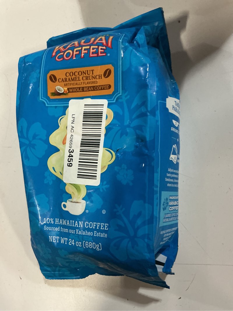 Condition photo showing New/Like New for (( BEST IF USED BY/02/05/2026))Kauai Coffee Whole Bean Coffee – Smooth, Non-Bitter Medium Roast Pure Arabica – Nutty Caramel and Tropical Coconut – Grown on Hawaii's Largest Coffee Farm – Coconut Caramel Crunch, 1 Pack of 24oz Coconut Caramel Crunch 24 Ounce (Pack of 1)