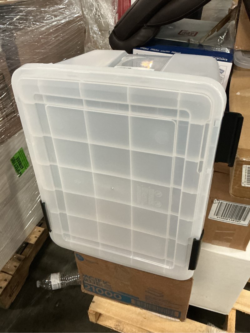 Condition photo showing As Is for iris weatherpro 46 qt clear storage box 11.75 in. h x 15.75 in. w x 19.7 in. d stackable