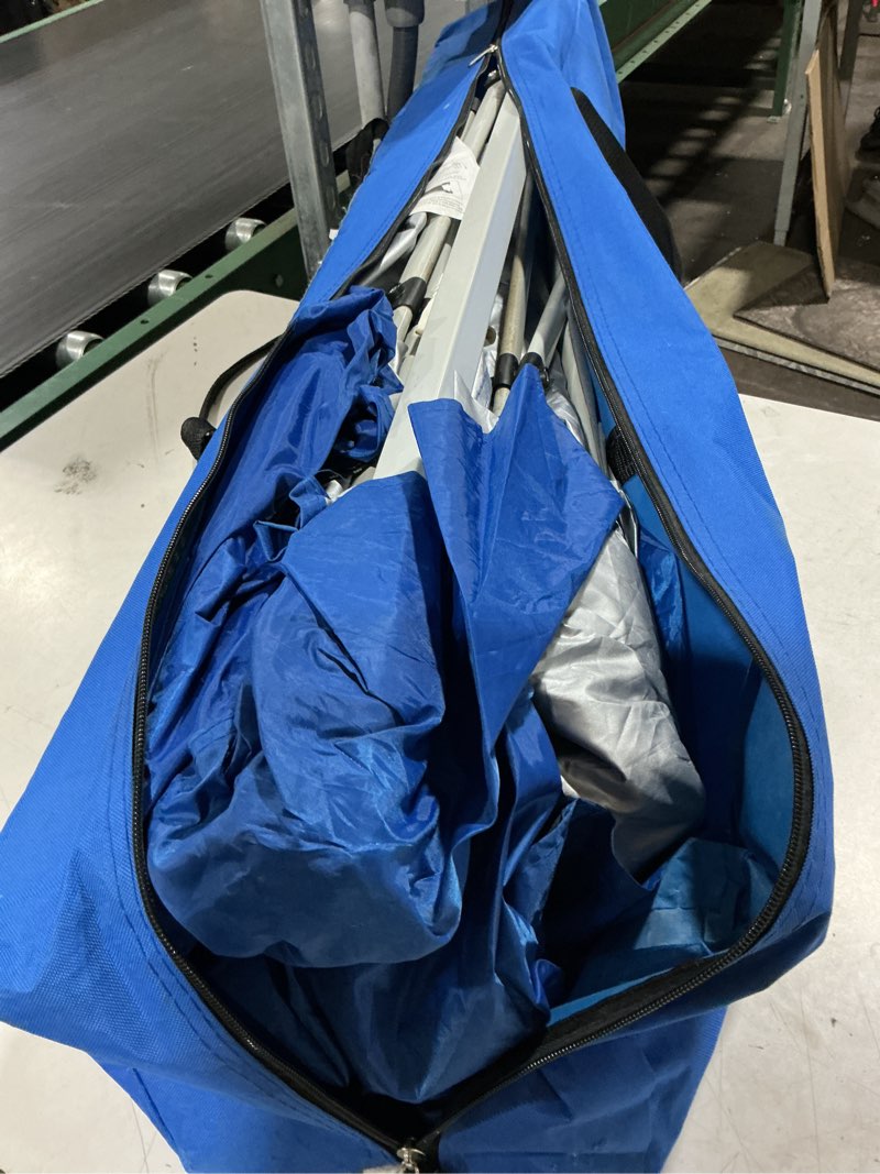 Condition photo showing As Is for ozark trail 10' x 10' instant slant leg pop-up canopy, blue, outdoor canopy type