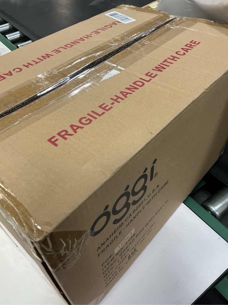 Condition photo showing Good Condition for Oggi Stainless Steel Roll Top Bread Box for Kitchen Countertop with Tempered Glass Lid - Fits Multiple Large Loaves of Bread and Other Freshly Baked Goods Including Cookies, Bagels, Muffins 15.25 x 8.25 x 8.25 Inches Roll top with Tempered Glass Lid