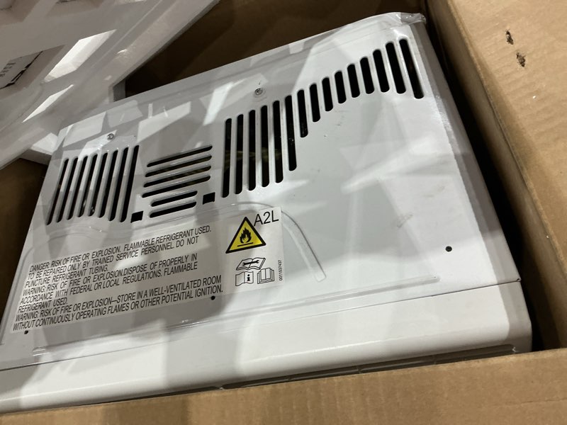 Condition photo showing As Is for ge window air conditioner unit, 5,000 btu for small rooms up to 150 sq ft. with manual adjustable fan and cooling settings, perfect for small bedroom or living room, easy install kit included, white new 5,000 btu mechanical controls white