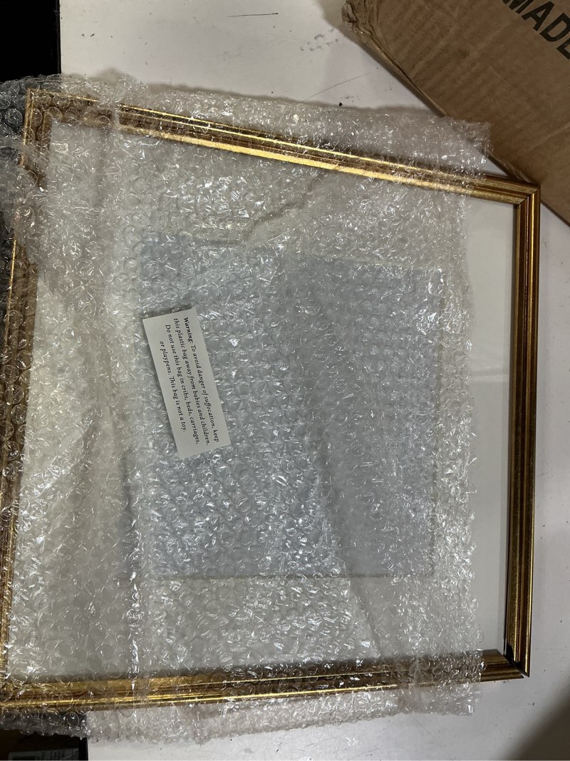 Condition photo showing As Is for sheffield home 9 piece gallery wall frame set, 12x12 inch, antique bronze bronze 12x12 inch