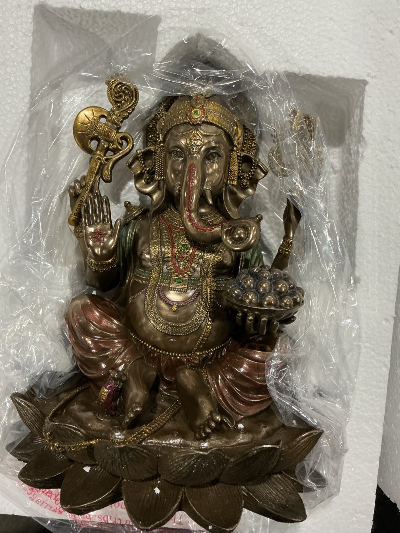 Condition photo showing Good Condition for Veronese Design 9 7/8 Inch Lord Ganesha Sitting on Lotus Hindu God Antique Bronze Finish Resin Statue