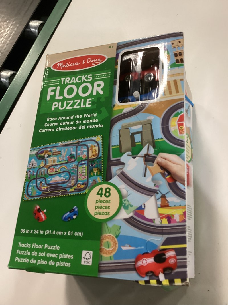 Condition photo showing New/Like New for melissa & doug race around the world tracks cardboard jigsaw floor puzzle and wind-up vehicles (48 pcs) for preschoolers and kids ages 4+ - fsc certified
