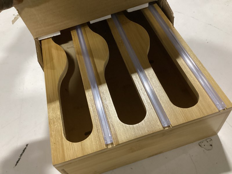 Condition photo showing Good Condition for Wrap Dispenser with Cutter and Labels, Plastic Wrap Organizer For Kitchen,Bamboo 3-in-1 Wrap Dispensers for Cling Wrap Aluminum Foil and Wax,Storage Organization Holder?Natural? 13.1in Natural