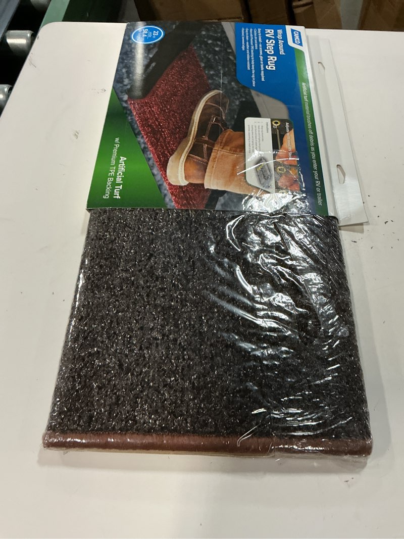 Condition photo showing New/Like New for camco 42944 premium wrap around rv step rug (turf material (22" x 23"))brown