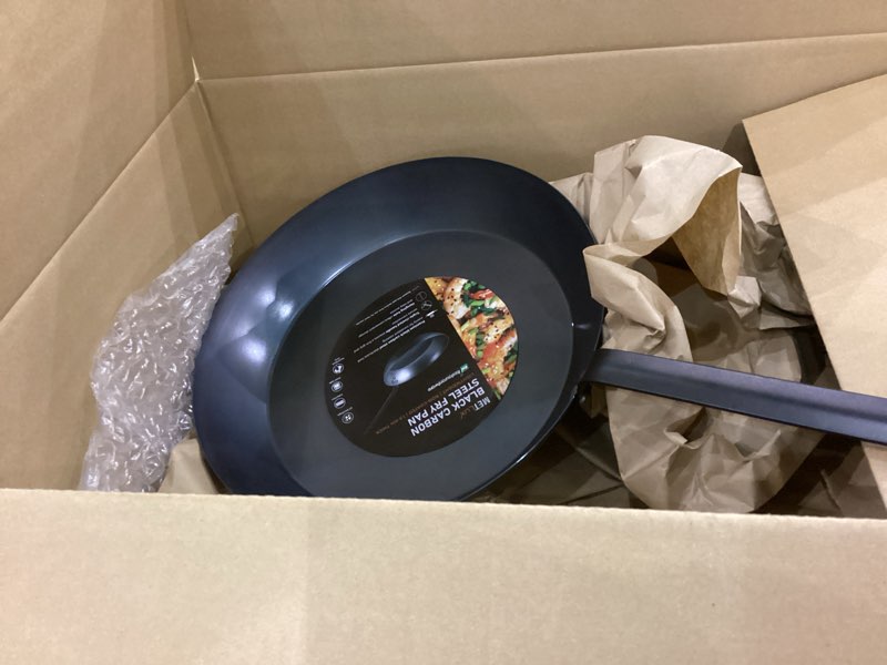 Black carbon steel fry pan