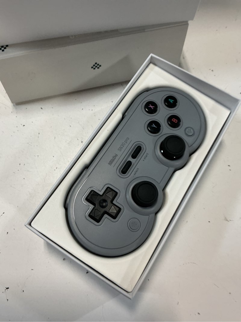 Condition photo showing Good Condition for 8bitdo sn30 pro wireless bluetooth controller, hall effect joystick update, retro gamepad for switch/switch 2, pc, steam deck, android, raspberry pi, iphone, ipad, macos and apple tv (gray edition) hall effect joystick gray edition