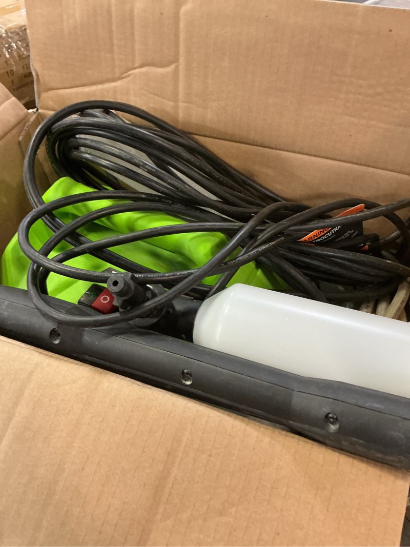 Condition photo showing As Is for greenworks 1800 psi 1.2-gpm cold water electric pressure washer with 2 spray tips