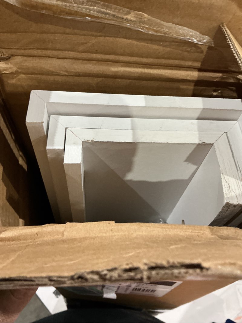 Condition photo showing Good Condition for amazon basics wood floating wall shelves, 3-pack, white