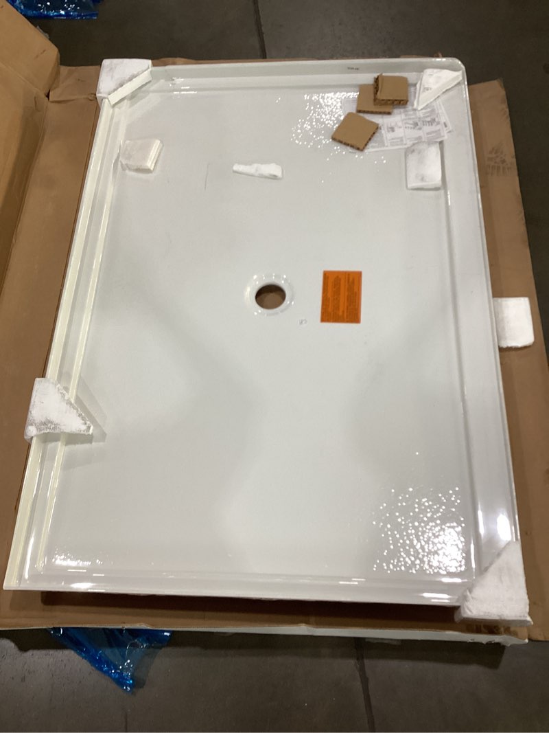 Condition photo showing As Is for KOHLER K-8659-0 Rely 60" x 42" Acrylic Alcove Shower Base with Single-Threshold, Molded-In Textured Floor, Center Drain, White 60" x 42" White