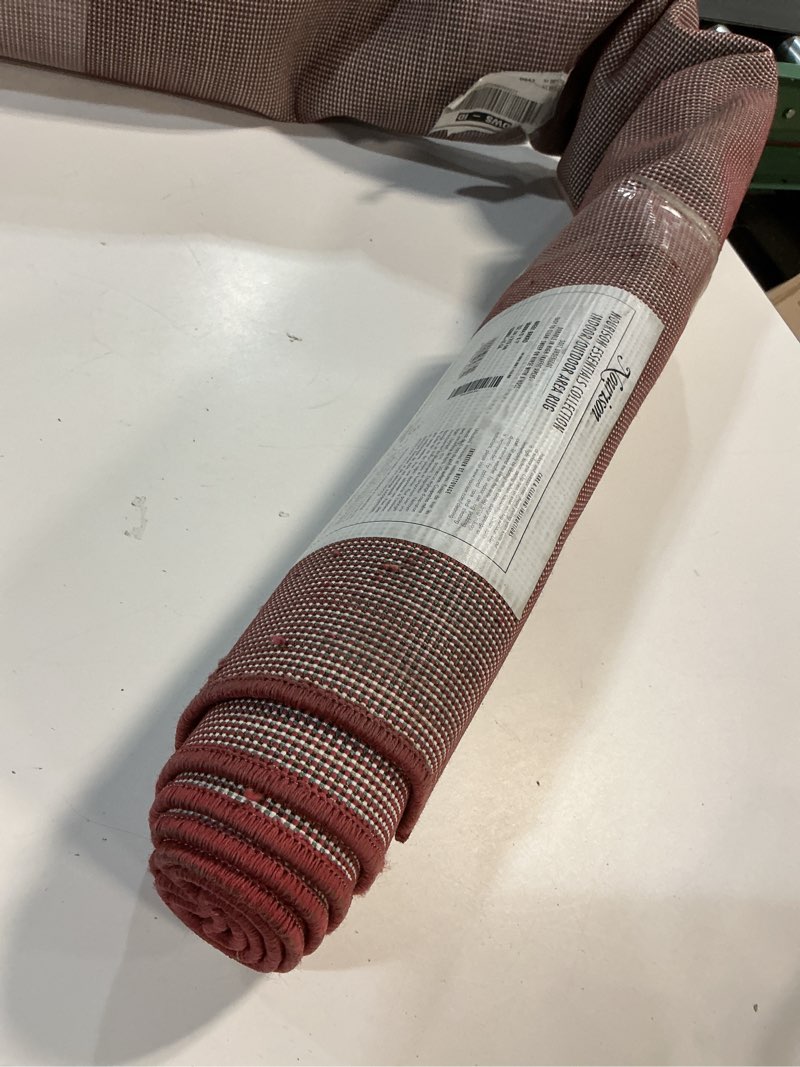 Condition photo showing As Is for Nourison Home Essentials 5' x 7' Brick Red Outdoor Indoor/Outdoor Rug 5' x 7' (Rectangular) Brick Red